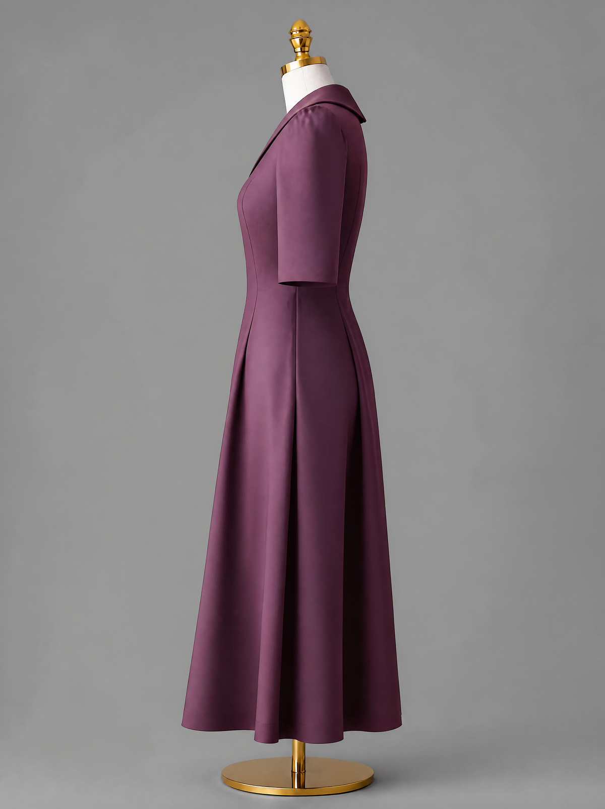  Side profile view of the Amethyst purple pleated dress and white corset overlay, showcasing the cinched waistline, tailored silhouette, and structured silhouette.
