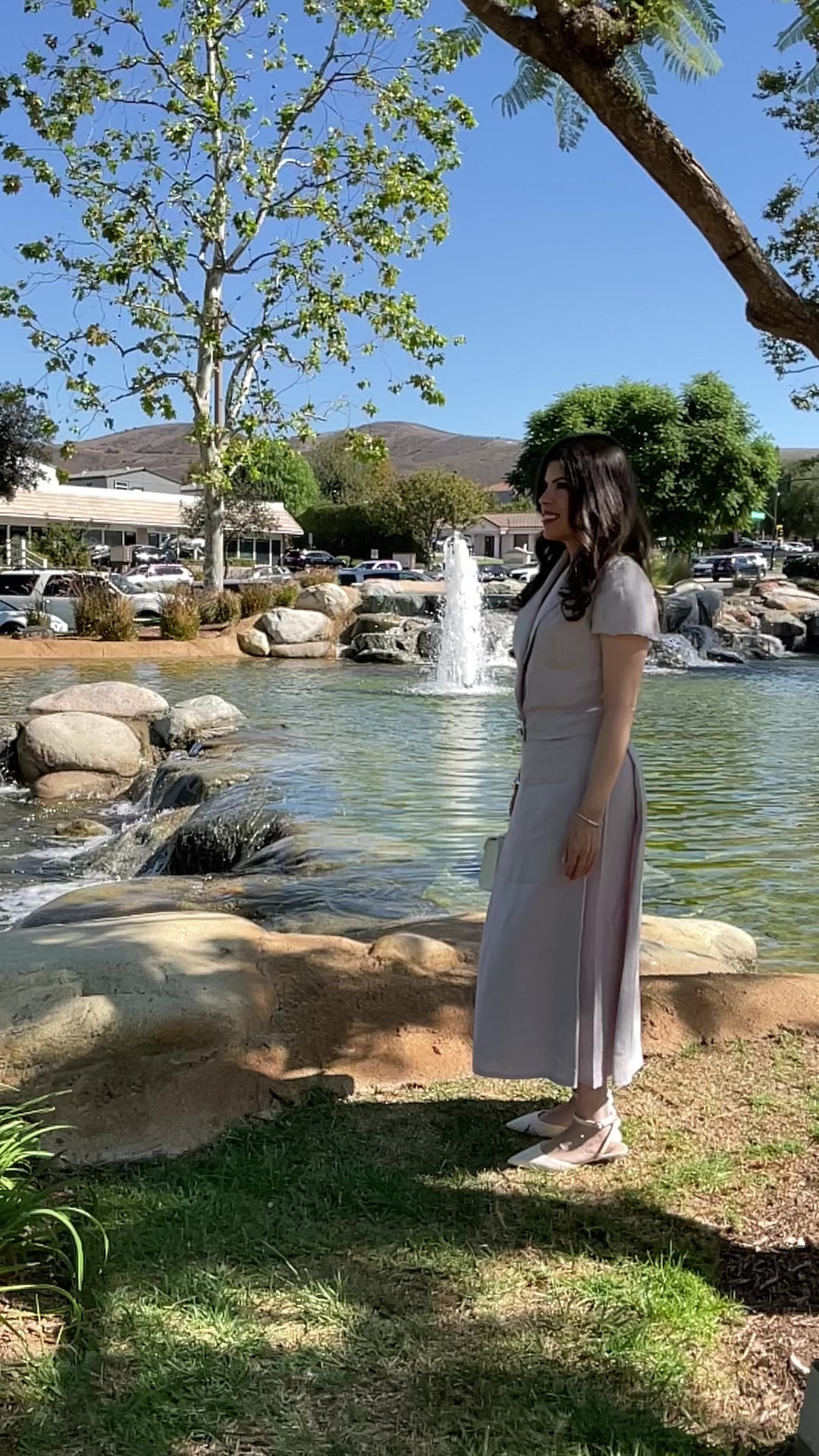 Video showing the movement, fluid flow, and elegant drape of The Silent Dove 2-piece gray linen suit as it spins.