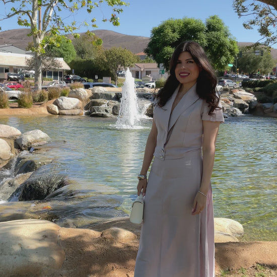• Video showing the front view, beautiful drape, and premium rhinestone buttons of The Silent Dove 2-piece gray linen suit.
